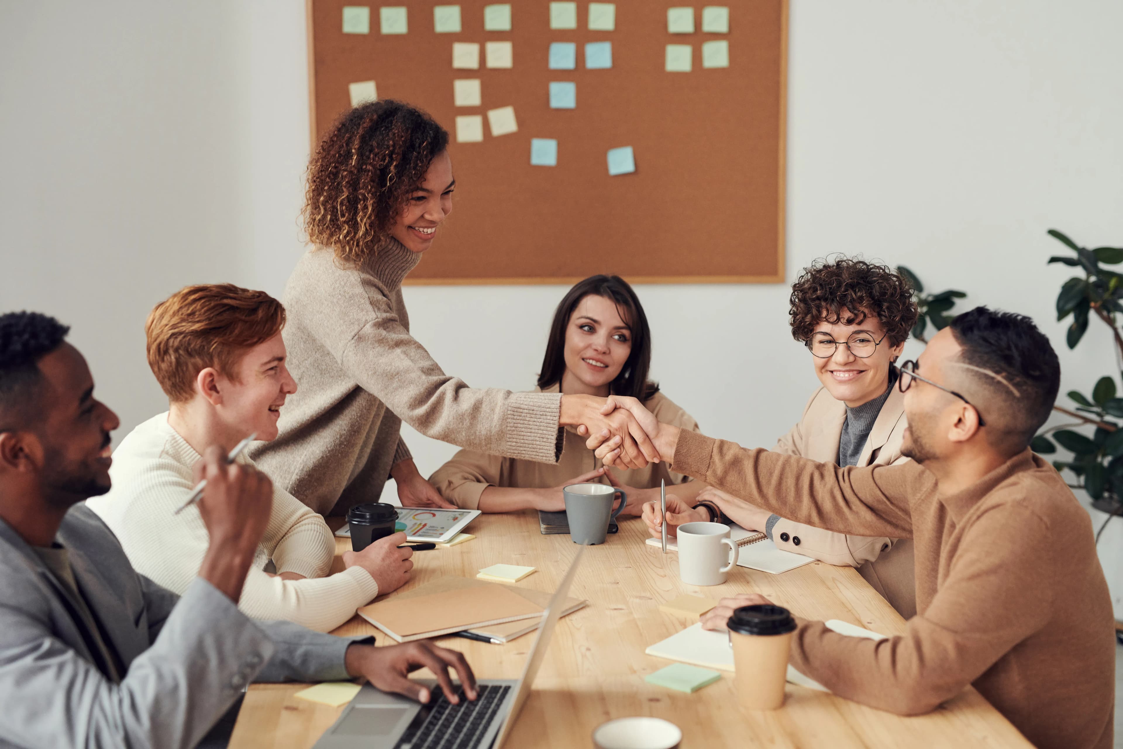 Business professionals collaborating at an office table