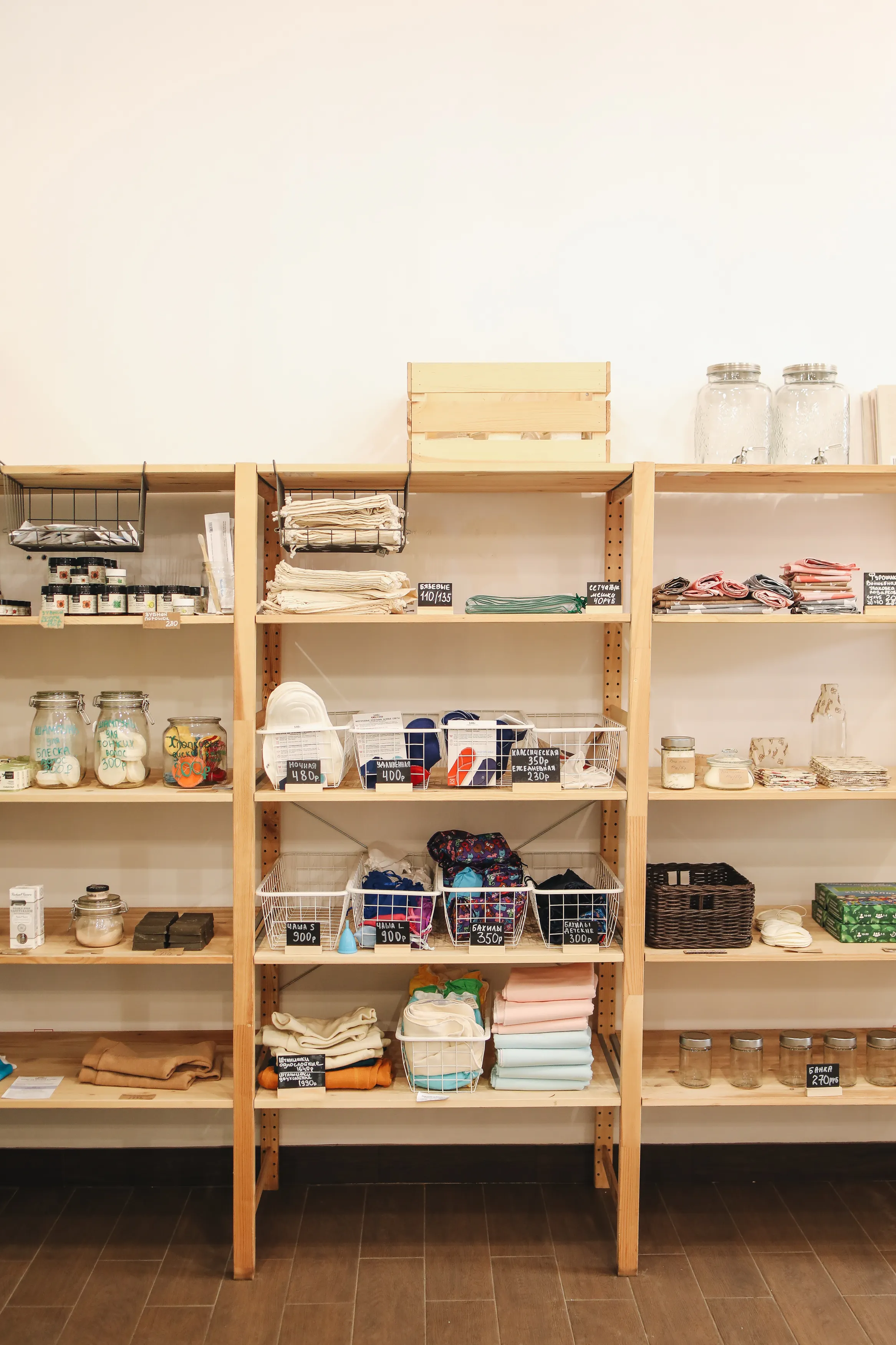 Shelves of products inside a small retail shop that tracks inventory with dedicated software